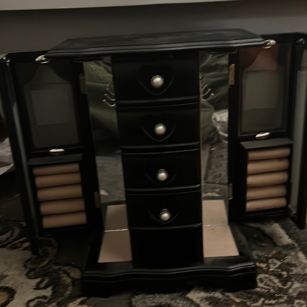 Black opening jewelry box
